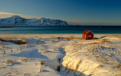 Scenic view of sea against clear blue sky