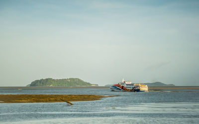 Boat on sea against sky