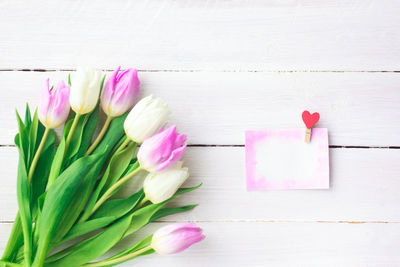 Close-up of pink tulip on table