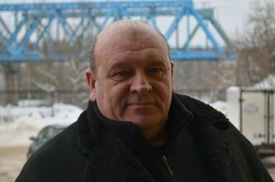Close-up portrait of mid adult man in winter