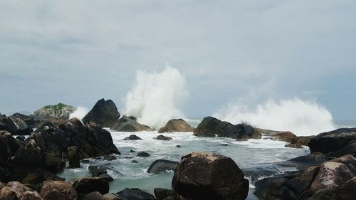 Waves splashing on rocks