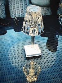 High angle view of electric lamp on table