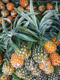 Full frame shot of pineapples at market