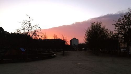 Scenic view of silhouette trees against sky at sunset