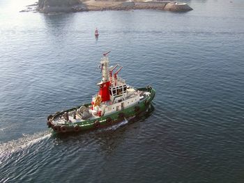 High angle view of ship sailing in sea