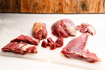 Close-up of meat on cutting board