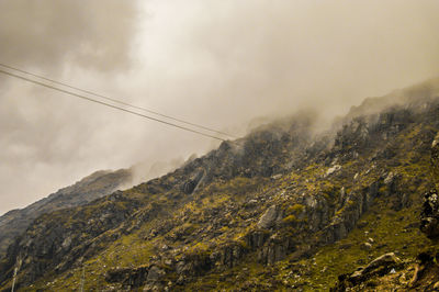 Low angle view of mountain against sky