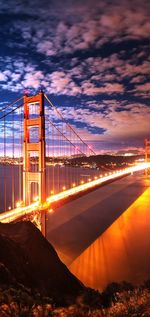 View of suspension bridge during sunset