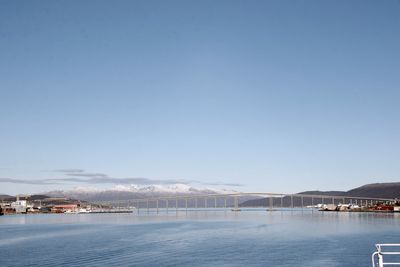 Scenic view of sea against clear blue sky