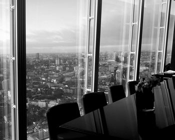 View of cityscape through window