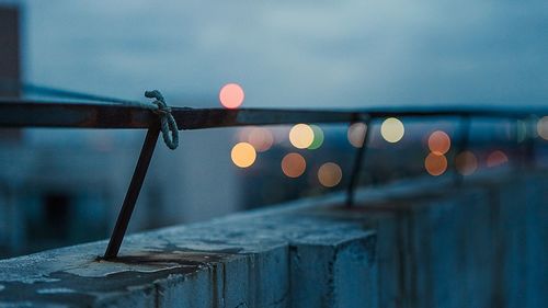 Close-up of railing on retaining wall