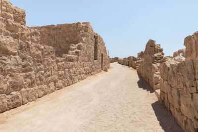 View of old ruins against clear sky