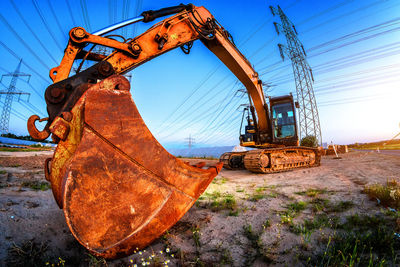 Construction site on field against sky