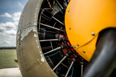 Close-up of airplane against sky