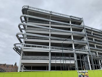 Low angle view of modern building against sky