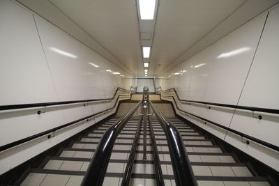 Low angle view of illuminated escalator