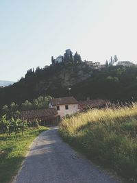 Road leading towards houses