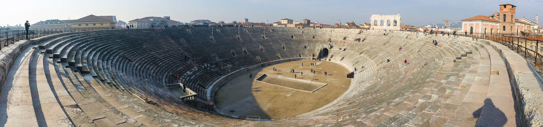 Panoramic view of historic amphitheater against sky at veneto