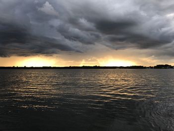 Scenic view of sea against dramatic sky