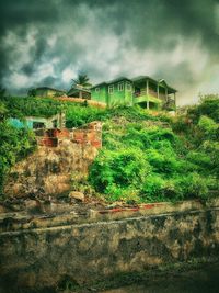 Scenic view of landscape against cloudy sky