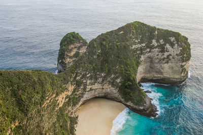 High angle view of rock formation on sea