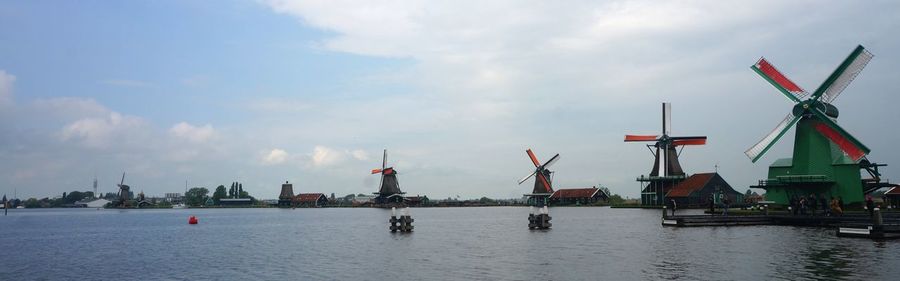 Boats in sea against sky