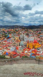 Aerial view of townscape against sky