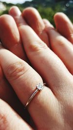 Close-up of couple hands