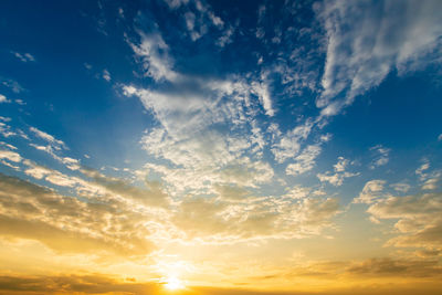 Low angle view of dramatic sky during sunset