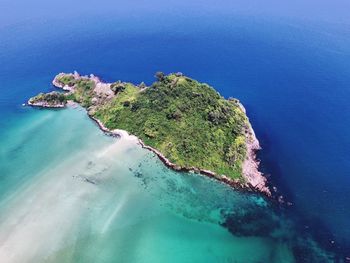 High angle view of sea against blue sky