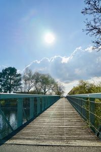 View of footbridge against sky