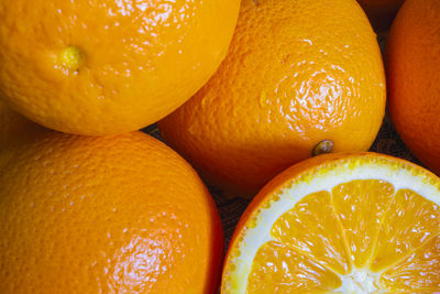 Ripe and juicy oranges close up