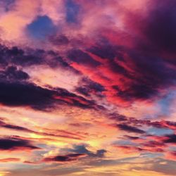 Low angle view of dramatic sky during sunset