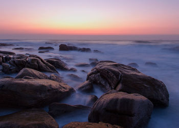 Scenic view of sea against sky during sunset