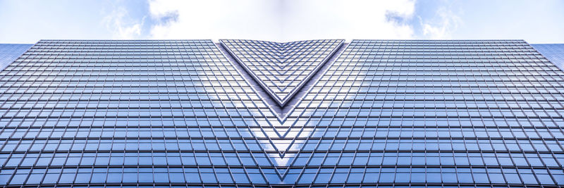 Low angle view of modern building against sky