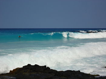 Waves splashing on rocks