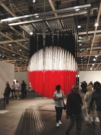 People in illuminated room