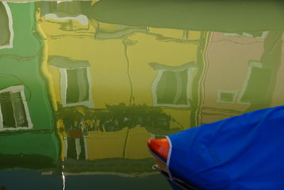 Low section of man wearing yellow shoes