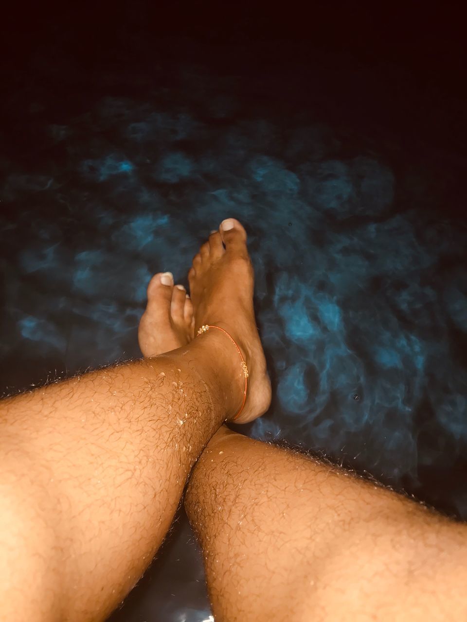 human body part, real people, lifestyles, body part, leisure activity, human leg, personal perspective, low section, water, men, nature, barefoot, relaxation, women, adult, wet, human foot, couple - relationship, human limb