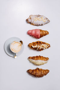 Directly above shot of coffee cup against white background