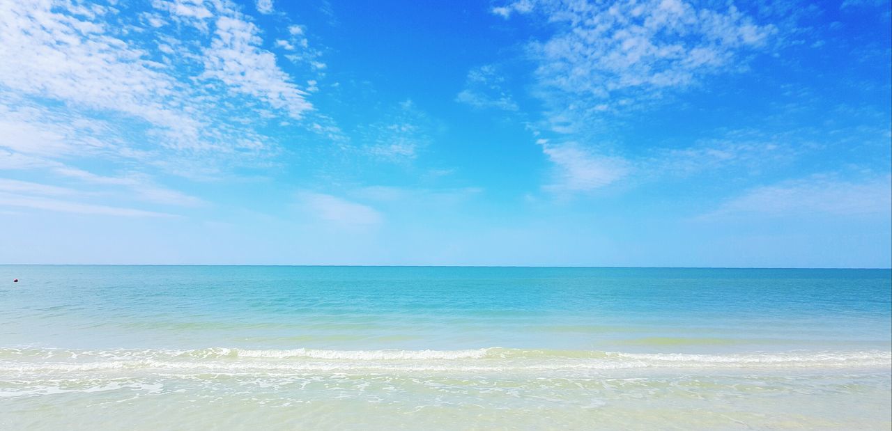 sea, horizon over water, water, tranquil scene, scenics, sky, tranquility, beauty in nature, blue, beach, nature, idyllic, cloud - sky, cloud, shore, seascape, sand, outdoors, wave, day