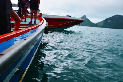 Close-up of boat sailing on sea