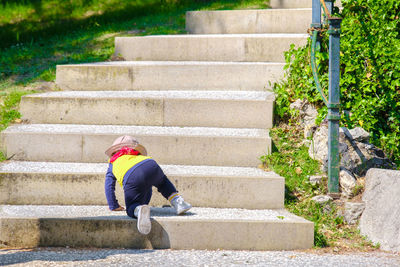 Newborn baby climb stairs