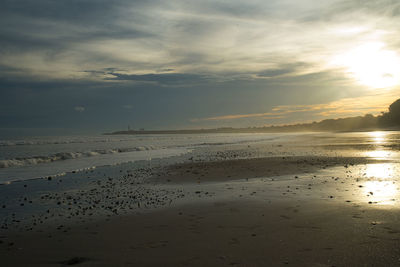 Scenic view of beach during sunset