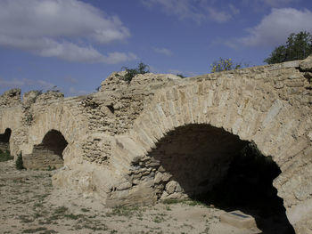 Rock formation on land against sky