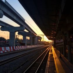 Railroad tracks on railroad station platform