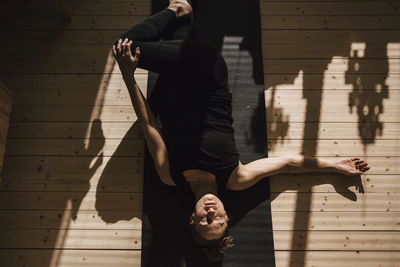 Woman exercising at home