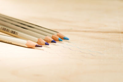 High angle view of colored pencils on table