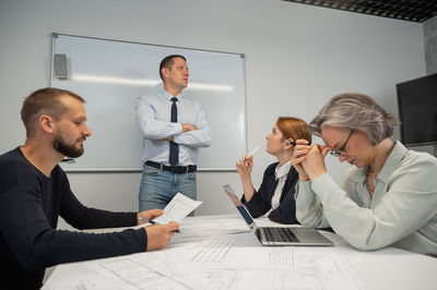 Business colleagues working in office