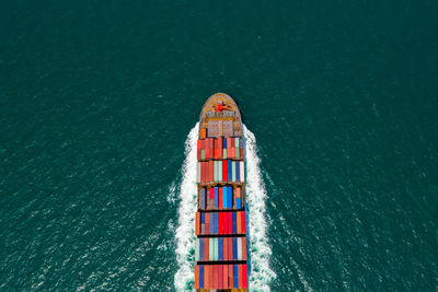 Aerial top view container cargo ship and import export business commercial logistic transportation 